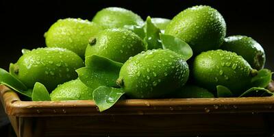 ai generiert frisch Feijoa Obst mit Wasser Tropfen isoliert auf schwarz Hintergrund. acca Sellowiana. generativ ai foto