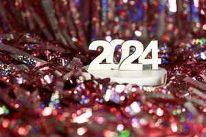 Zahlen 2024 auf das Podium. glücklich Neu Jahr Konzept foto