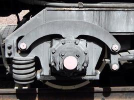 Eisenbahntransportdetails von Lokomotive, Waggon foto