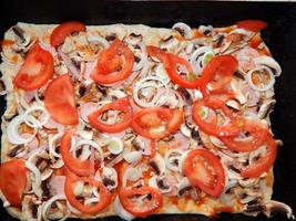 Essen kochen und Essenszutaten Pizza foto