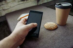 Bleistift, Notizbuch und Papier Kaffee Tasse foto