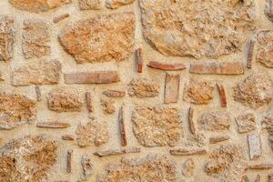 Hintergrund, Textur - - Rau Mauerwerk von wild Stein und Zement foto