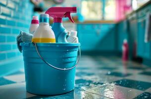 ai generiert Zuhause Reinigung Produkte im ein Blau Eimer Innerhalb Küche, foto