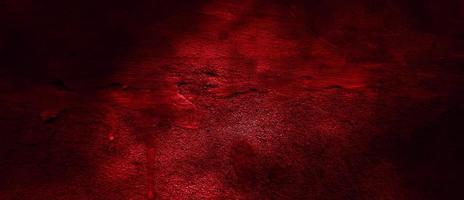 gruseliger roter und schwarzer Horrorhintergrund. dunkler Grunge roter Beton foto