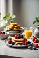 ai generiert Stapel von köstlich Pfannkuchen gekrönt mit frisch Beeren und Blaubeeren auf ein Teller foto