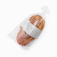 frisch gebacken Brot im ein Plastik Tasche foto