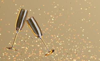 Champagnergläser schweben mit goldenem Konfetti foto