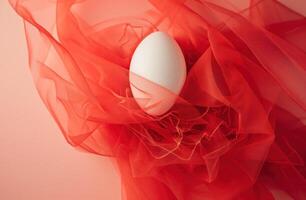 ai generiert dekorativ Weiß Ei gekrönt mit rot Tüll foto