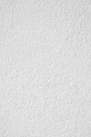 Oberfläche von das Weiß Stein Textur rauh, grau-weiß Ton, Farbe Mauer. verwenden diese zum Hintergrund oder Hintergrund Bild. Zement Mauer. nahtlos Textur Weiß zum Jahrgang foto