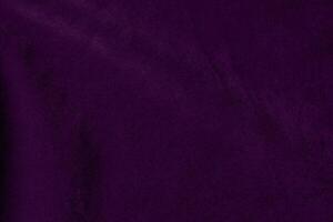dunkel lila Samt Stoff Textur benutzt wie Hintergrund. violett Farbe lila Stoff Hintergrund von Sanft und glatt Textil- Material. zerquetscht Samt .Luxus dunkel Ton zum Seide. foto