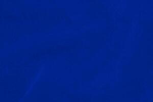 Licht Blau Samt Stoff Textur benutzt wie Hintergrund. Seide Farbe Denim Stoff Hintergrund von Sanft und glatt Textil- Material. zerquetscht Samt .Luxus Marine Blau Licht Ton zum Seide. foto