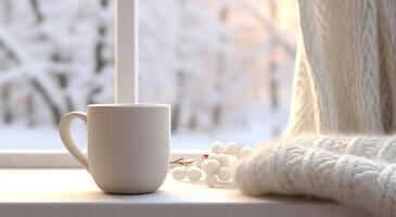 ai generiert ein Weiß Tasse sitzt auf ein Fenster Schwelle in der Nähe von etwas Winter Landschaft foto