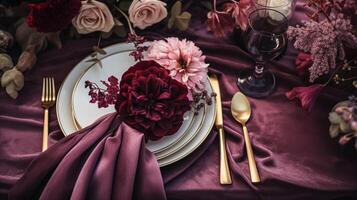 ai generiert Abendessen Tabelle Rahmen im das warm glühen von Kerzenlicht, Tischlandschaft mit Blumen- Kernstück, elegant Burgund Glaswaren, und luxuriös Gold Besteck foto