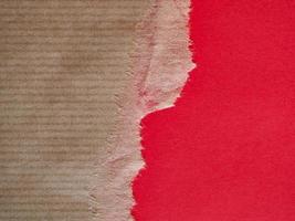 brauner und roter Papierbeschaffenheitshintergrund mit Kopienraum foto