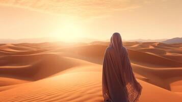 ai generativ Frau tragen Hijab Gehen im das Wüste Sand Dünen beim Sonnenuntergang Fernweh Wohlbefinden Glück und Reisen Konzept foto