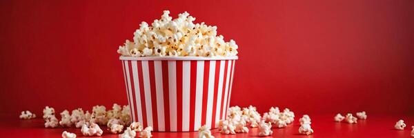 ai generiert rot und Weiß gestreift Popcorn Eimer überfüllt auf ein rot Hintergrund, perfekt zum Kino, Snack, und Essen Themen. foto