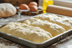 ai generiert roh Hefe Teig Bälle im Tablett Vor Backen. Konzept Zuhause Backen Brot. generativ ai foto