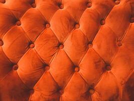 Nahansicht Orange Leder Sofa Rückenlehne Hintergrund foto
