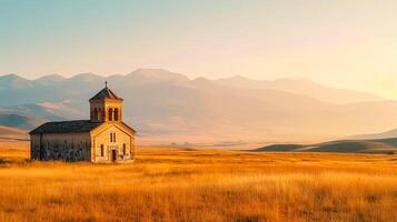 ai generiert Foto von ein alt, isoliert Kirche umgeben durch riesig Feld mit Berge im das Hintergrund. das Kirche gebaut mit Beige Steine, Berge im das Hintergrund ai generiert