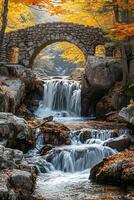 ai generiert heiter Bild erfasst malerisch Wasserfall fließend inmitten Felsen Terrain. ein alt Stein Brücke, verwittert noch robust, Bögen anmutig Über das Kaskadierung Wasser ai generiert foto