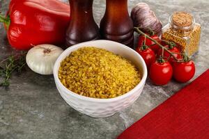 trocken Weizen Bulgur Müsli Haufen foto