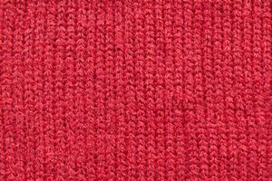 rot gestrickter Wollstoff Textur Hintergrund foto