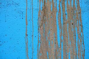 Schlamm beflecken auf Blau Farbe Beton Mauer Textur Hintergrund. foto