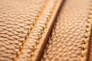 Luxus braun Leder Tasche Textur Hintergrund mit Nähen foto