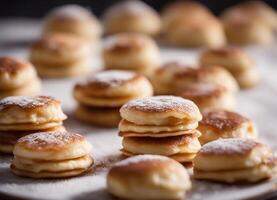 ai generiert Stapel von poffertjes ein traditionell Niederländisch Pfannkuchen mit Zucker Pulver foto