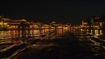 ai generiert Dämmerung Gelassenheit Über direkt am Wasser Stadtbild foto