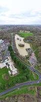 Antenne Panorama- Aussicht von Corby Stadt, Dorf von England vereinigt Königreich während wolkig und regnerisch Wetter von Winter. Januar 11., 2024 foto