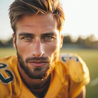 ai generiert gut aussehend Fußball Spieler posieren suchen beim das Kamera während Stehen auf das Fußball Feld foto