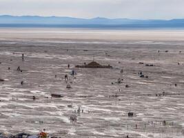 Antenne Aussicht von das Verbrennung Mann Festival im Nevada Wüste. schwarz Felsen Stadt von über. foto