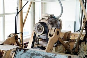 Fragment von ein alt Muschel Maschine im das Geschäft von ein Süßwaren Fabrik foto