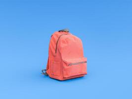 rot Rucksack auf Blau Hintergrund, minimal lehrreich Konzept foto