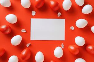 ai generiert Weiß leeren Karte platziert im ein Kreis von rot und Weiß Keramik Eier foto
