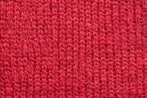 rot gestrickter Wollstoff Textur Hintergrund foto