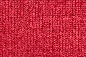 rot gestrickter Wollstoff Textur Hintergrund foto