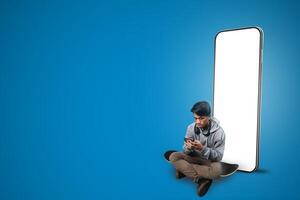 ein Schüler ist Sitzung mit ein groß Bildschirm Smartphone auf ein Blau Hintergrund foto