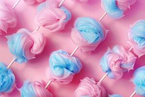 ai generiert Muster mit Baumwolle Süßigkeiten auf Rosa Hintergrund. foto