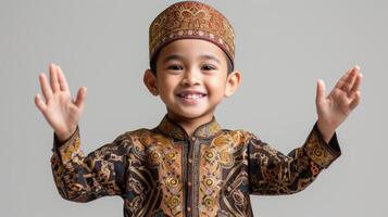 ai generiert glücklich süß asiatisch Junge tragen traditionell Muslim Kleider foto