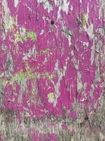 schäbig alt beachten Tafel Grunge Hintergrund mit Rosa Farbe Schrott foto
