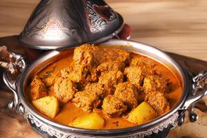 genießen das exquisit Lamm oder Rindfleisch Curry Rendang, bereit zu Sein genossen auf eid al-adha, Erfassen das Wesen von Feier im ein perfekt Foto, präsentieren kulinarisch Meisterschaft und festlich Genuss foto