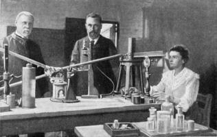 Herr und Frau Curie im ihr Labor, Jahrgang Gravur. foto