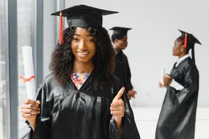 Gruppe von afrikanisch amerikanisch Absolvent Studenten foto