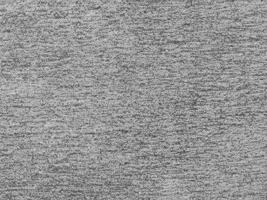 Heidekraut grau Strickwaren Stoff Textur, gemütlich und stilvoll foto