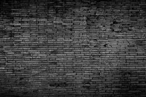 roh unverputzt schwarz Backstein Mauer Textur foto