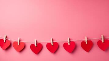 ai generiert Papier Herzen auf Wäscheklammern auf ein Rosa Hintergrund. Valentinstag Tag Hintergrund foto