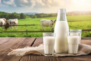 ai generiert Flasche von Milch mit Brille von Milch auf ein hölzern Hintergrund mit Weiden lassen Kühe im das Hintergrund foto