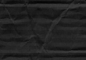 zerknittert schwarz Kraft Papier Textur Banner Hintergrund foto